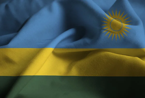 Primo piano della Bandiera del Ruanda increspata, Bandiera del Ruanda che soffia nel vento — Foto Stock
