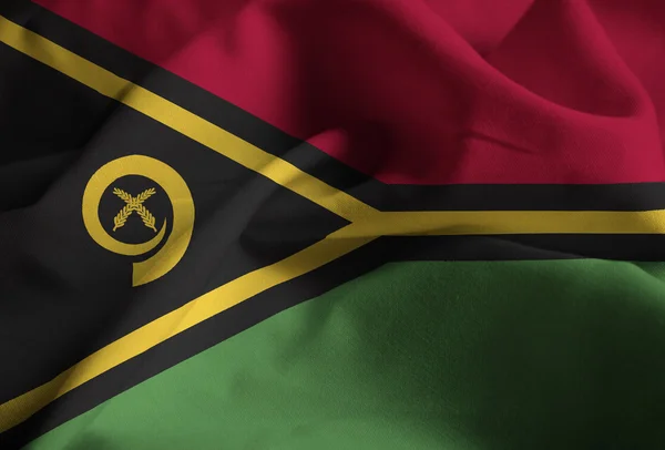 Closeup prohrábl Vanuatu vlajka, Vanuatu vlajka vlající ve větru — Stock fotografie