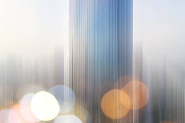 Soyut iş dünyası modern şehir kentsel fütüristik mimari geçmişi. Emlak konsepti, hareket bulanıklığı, yüksek gökdelen cephesinin camında yansıma, Bokeh ile tonlu mavi resim