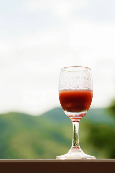 Juice in wine glass. — Stock Photo, Image