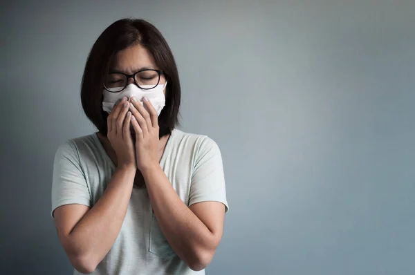Illness, disease, cold  concepts.  Asian glasses woman has a col