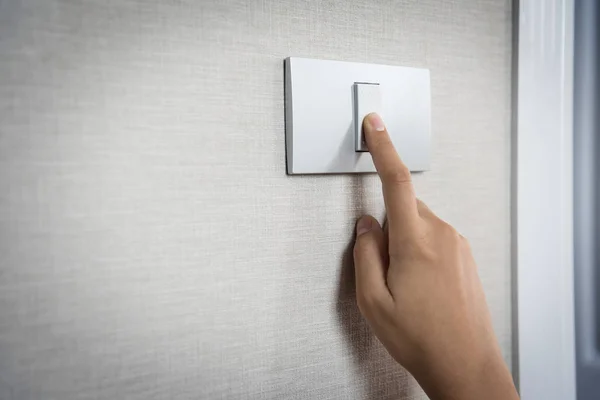 Encendido o apagado manual en interruptor de luz gris con textur — Foto de Stock