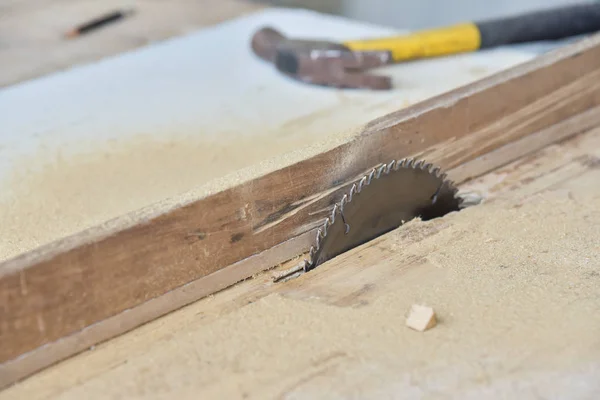 Circular saw on wooden table. — Stock Photo, Image