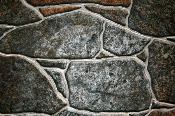 Каменная декоративная тарелка для пола. серый с белыми трещинами . — стоковое фото