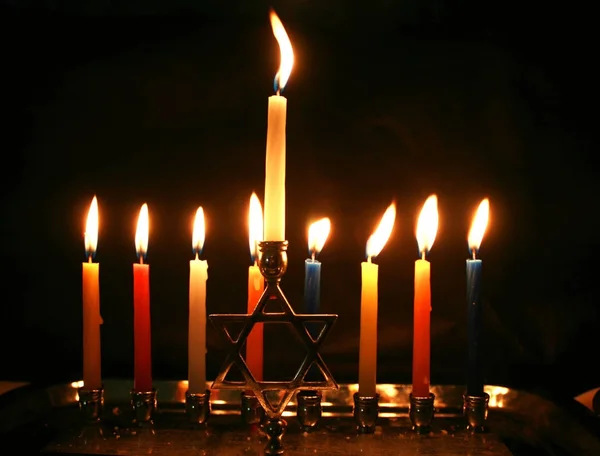 Burning Chanukah. The lit Chanukiah. Jewish holiday Hanukkah. — Stock Photo, Image
