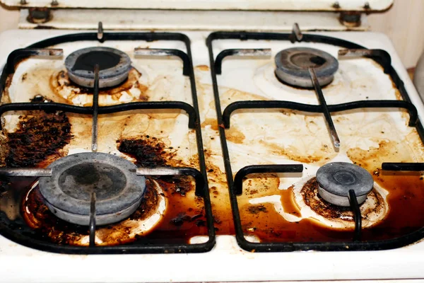 Dirty gas stove. Fat, rust on the surface. — Stock Photo, Image