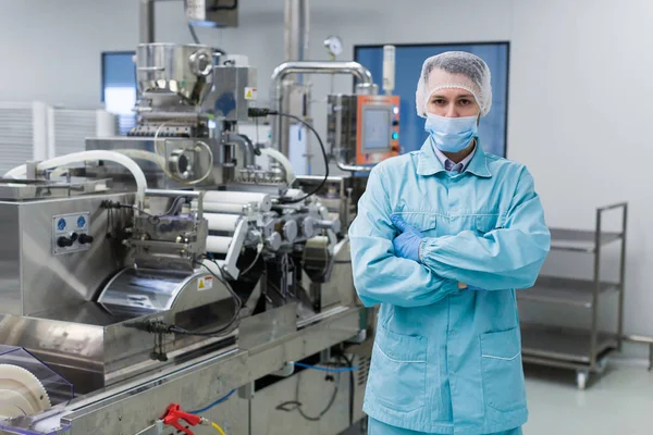 Scientist stand near control panel — Stock Photo, Image