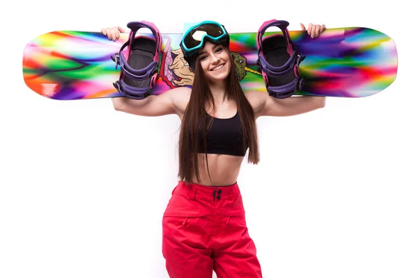 De jonge vrouw schoonheid met de snowboard op sholders — Stockfoto