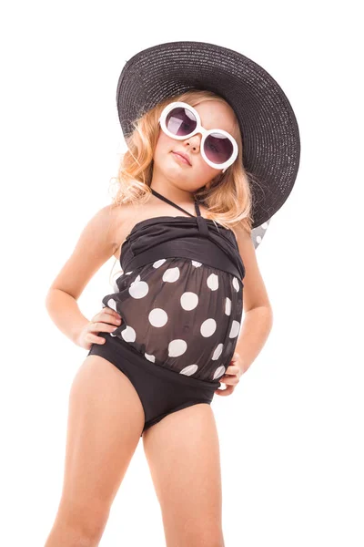 Kleines blondes Mädchen in schwarzer Badebekleidung — Stockfoto