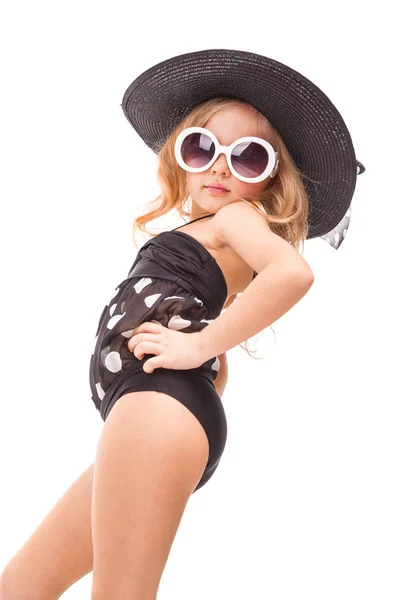Petite fille blonde en maillot de bain noir — Photo
