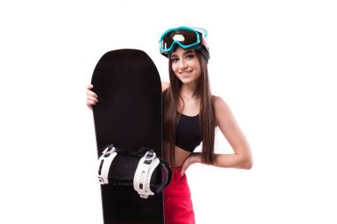 ince genç kadın snowboard tutar