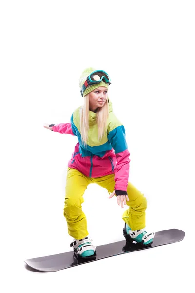 Femme en costume de ski monte snowboard — Photo