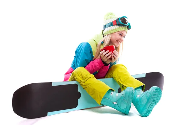 Woman in ski suit with snowboard — Stock Photo, Image