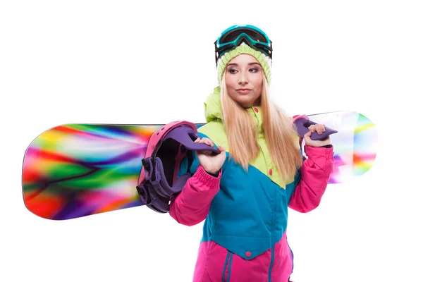 Vrouw in ski outfit met snowboard — Stockfoto