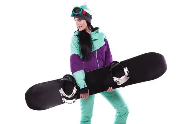 Femme en costume de ski violet avec snowboard — Photo