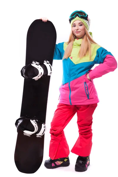Жінка в лижному спорядженні зі сноубордом — стокове фото