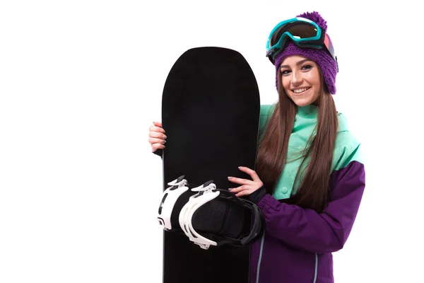 Όμορφη γυναίκα στο κοστούμι σκι με snowboard — Φωτογραφία Αρχείου