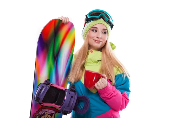 Vrouw in ski outfit met snowboard — Stockfoto