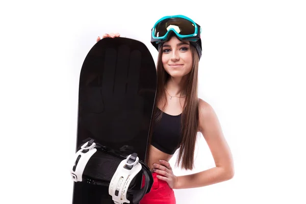 Slim young woman holds snowboard — Stock Photo, Image