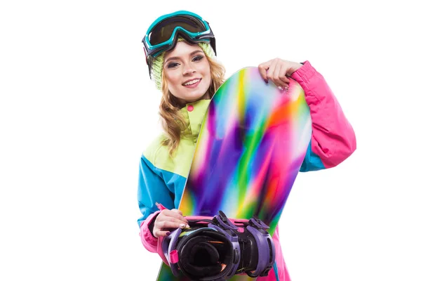 Menina bonita em terno de esqui com snowboard — Fotografia de Stock