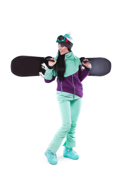 Femme en costume de ski violet avec snowboard — Photo