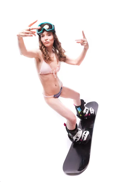 Mujer bastante sexy en bikini en snowboard — Foto de Stock