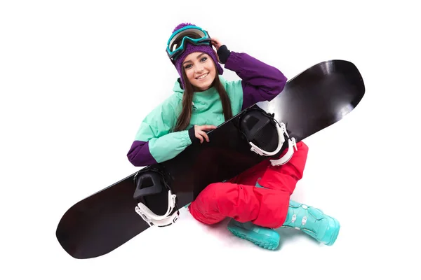 Pretty woman in ski suit with snowboard — Stock Photo, Image