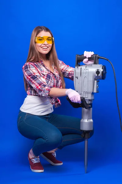 Brunette woman in protective goggles — Stock Photo, Image