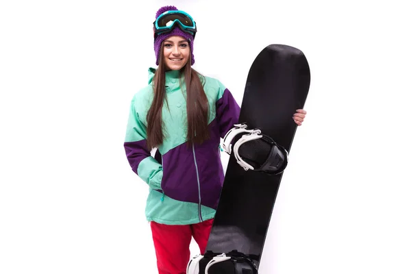 Mooie vrouw in ski pak met snowboard — Stockfoto