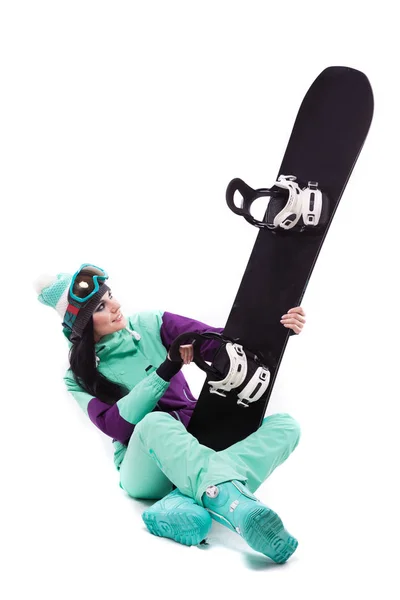 Mujer en traje de esquí púrpura con snowboard —  Fotos de Stock