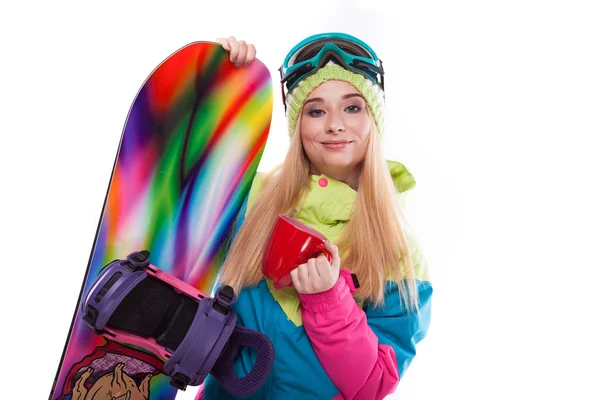 Kvinna i skid outfit med snowboard — Stockfoto