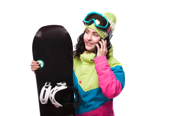 Vrouw in ski kostuum met snowboard — Stockfoto