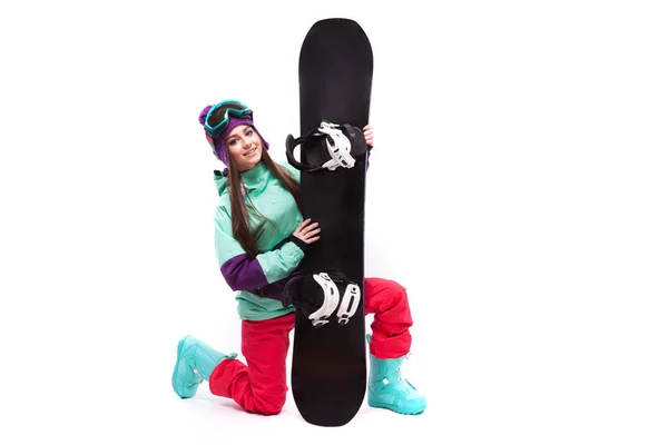 Jolie femme en costume de ski avec snowboard — Photo