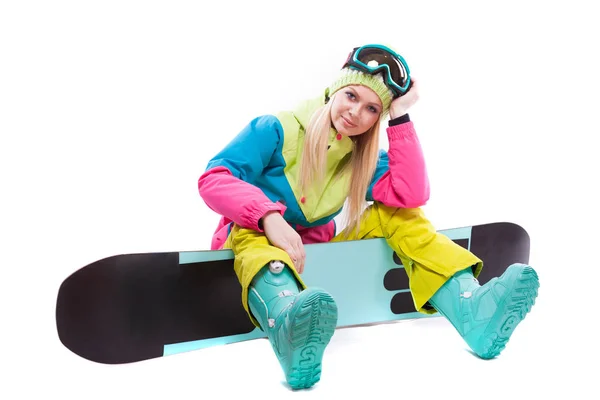 Mujer en traje de esquí con snowboard —  Fotos de Stock