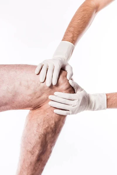 Doktor bacak bloke damarlı inceliyor — Stok fotoğraf