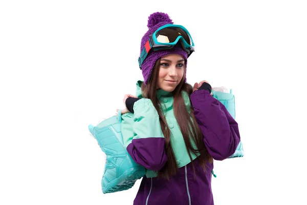 Mujer joven en traje de esquí púrpura —  Fotos de Stock