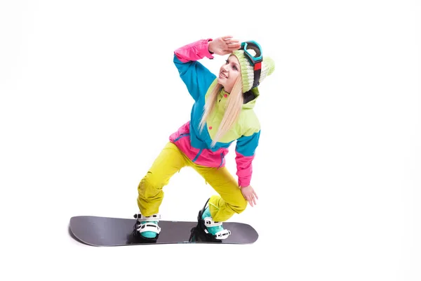 Frau im Skianzug mit Snowboard — Stockfoto