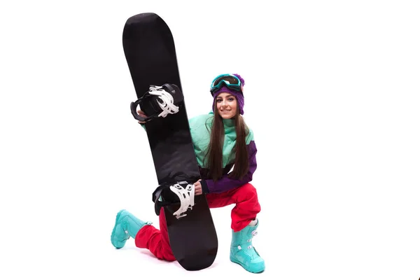 Jolie femme en costume de ski avec snowboard — Photo