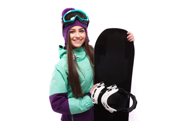 Jolie femme en costume de ski avec snowboard — Photo