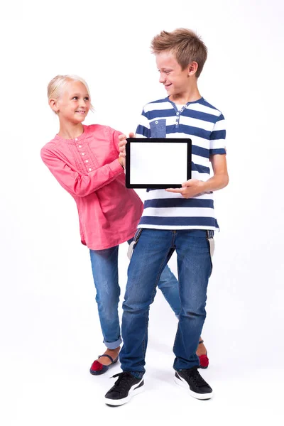 Schoolchildren with modern tablet — Stock Photo, Image
