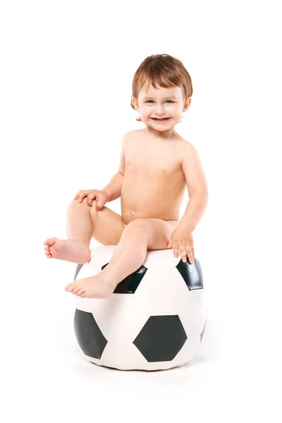Baby on big soccer ball — Stock Photo, Image