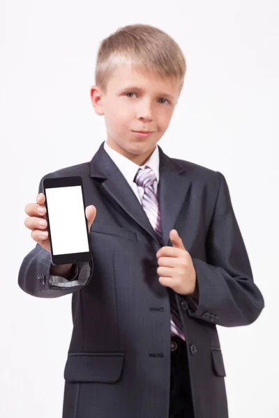 School boy in suit with phone — Stock Photo, Image