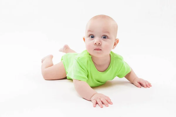 Smiling baby boy on his stomach — Stock Photo, Image