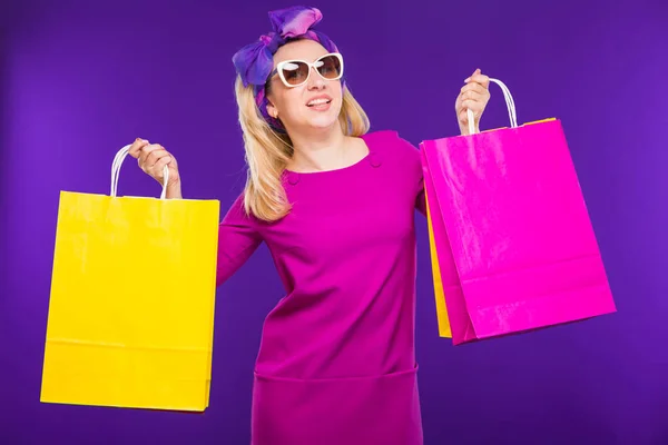 Girl with paper bags — Stock Photo, Image