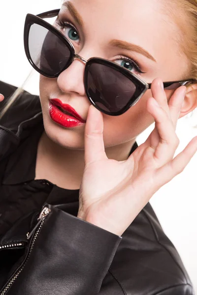 Blonde girl in leather jacket Royalty Free Stock Photos