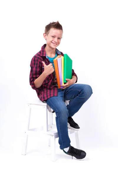 Glad skolpojke med böcker — Stockfoto