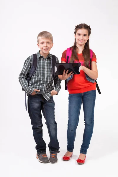 School kids studying with tablet — Stock Photo, Image