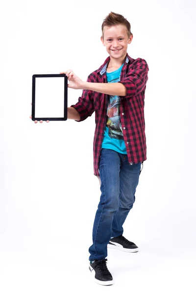 Happy schoolboy with tablet — Stock Photo, Image