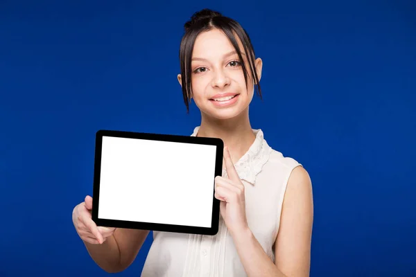 Young girl with tablet in hands — Stock Photo, Image