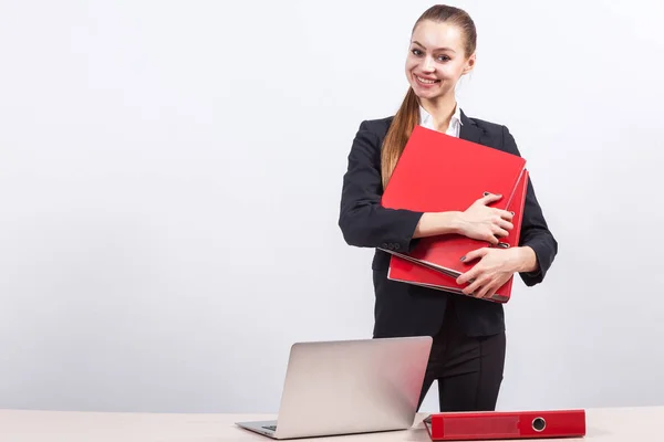 Girl manager with folders in office — Stock Photo, Image